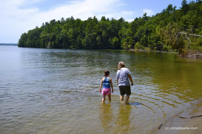 Wading in Niquette Bay State Park by Adam White