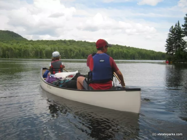 Family boating at Osmore Pond, New Discovery State Park by Matt Parsons