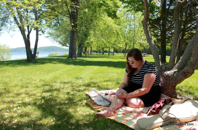 Artist at Sand Bar State Park by Meghan Lynch