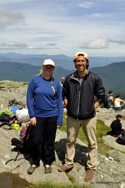 A couple looking very happy after reaching the summit, Underhill State Park