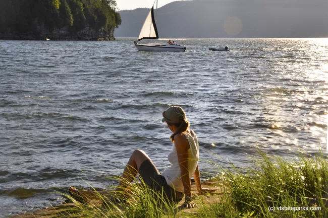 Watching a sailboat come in at Kingsland Bay State Park by Julia Parent