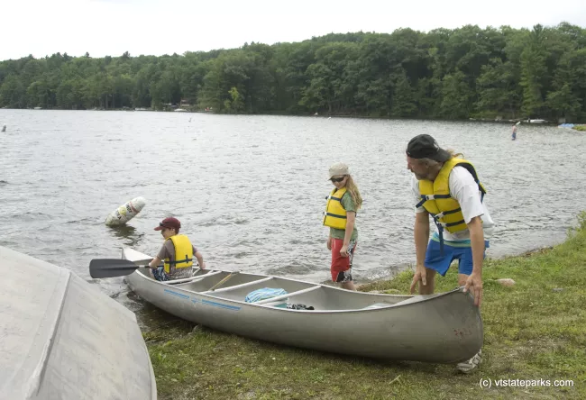 Matthew Broad of Putney, VT ends aweekend camping trip with a canoe trip with his sons,  Aja and Kaelan Selbach-Broad, at Bomozeen State Park. Photo by Karen Pike