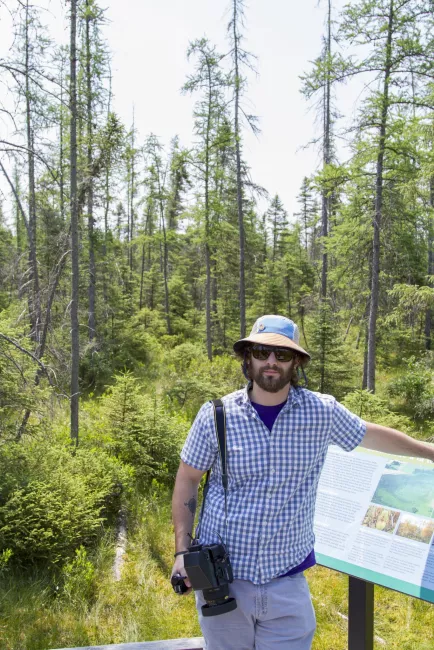 Hiker at Lake Carmi State Park by Karalyn Mark