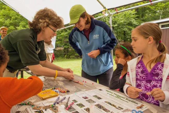 Park interpreter leading an activity