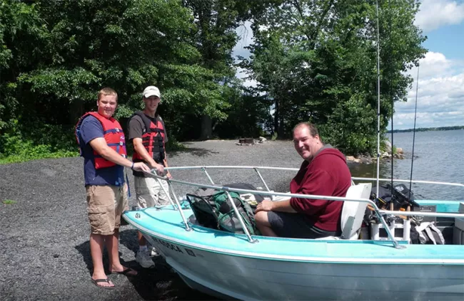 Campers dock their boat at a remote campsite on the island